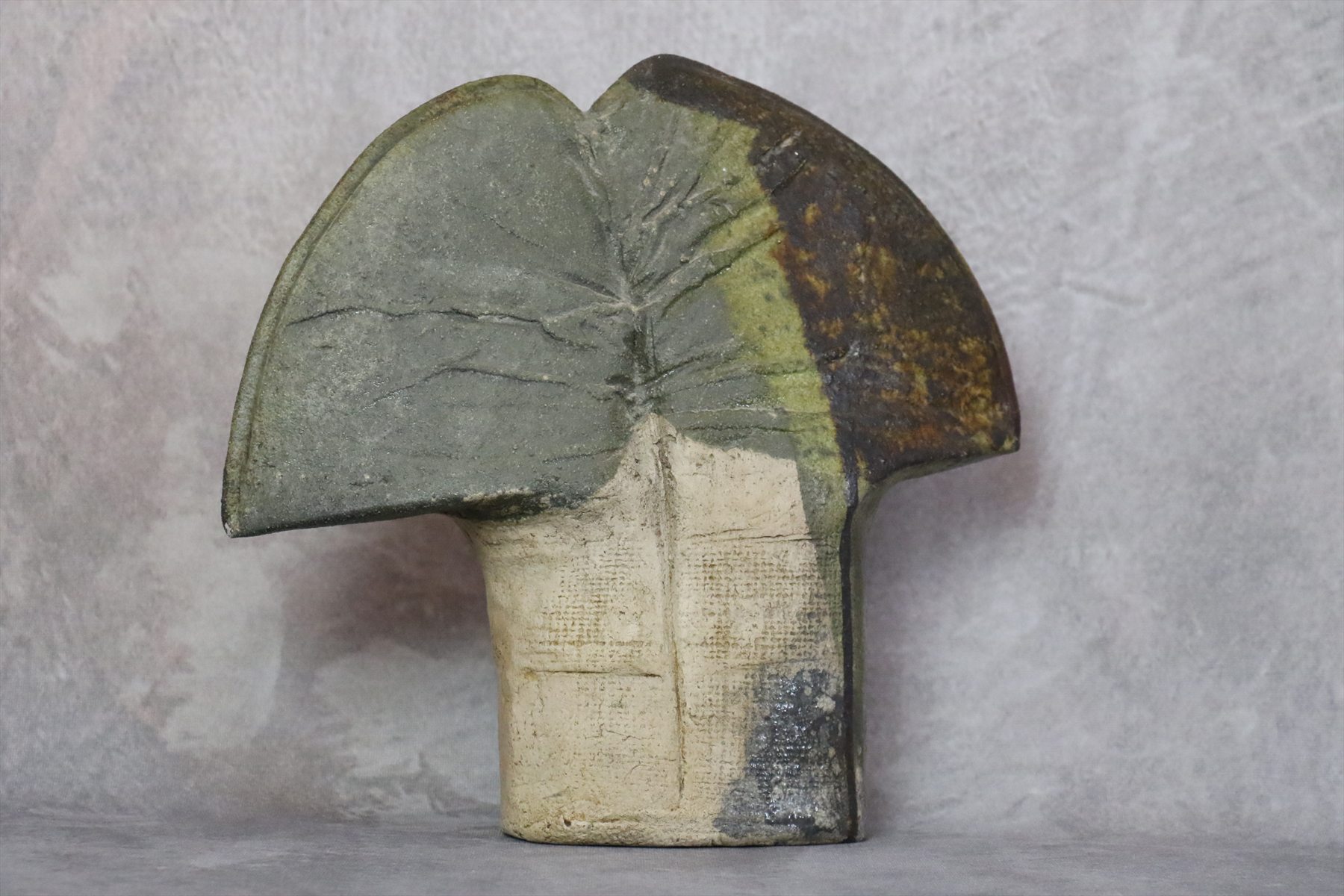 Sage Green and Brown Ceramic Sculpture with Raw Stoneware