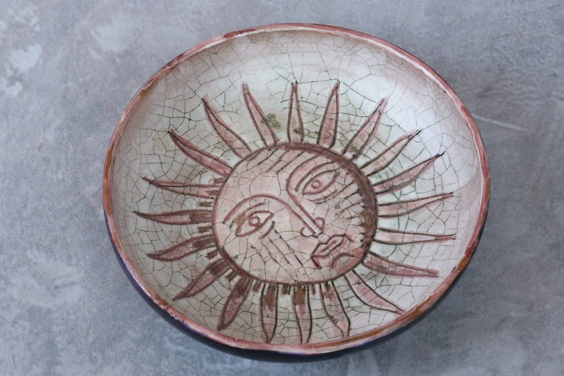 Glazed Ceramic Bowl Decorated with a Sun